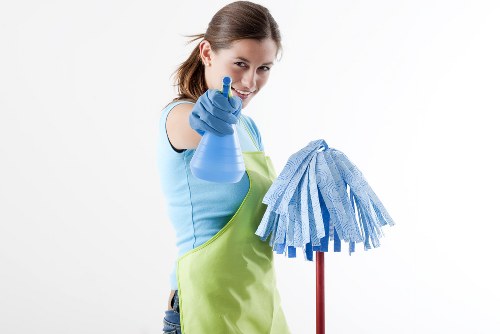 Carpet cleaning team using sustainable recycling practices in W2