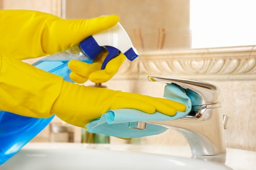 Carpet cleaning team assessing a service issue and notes